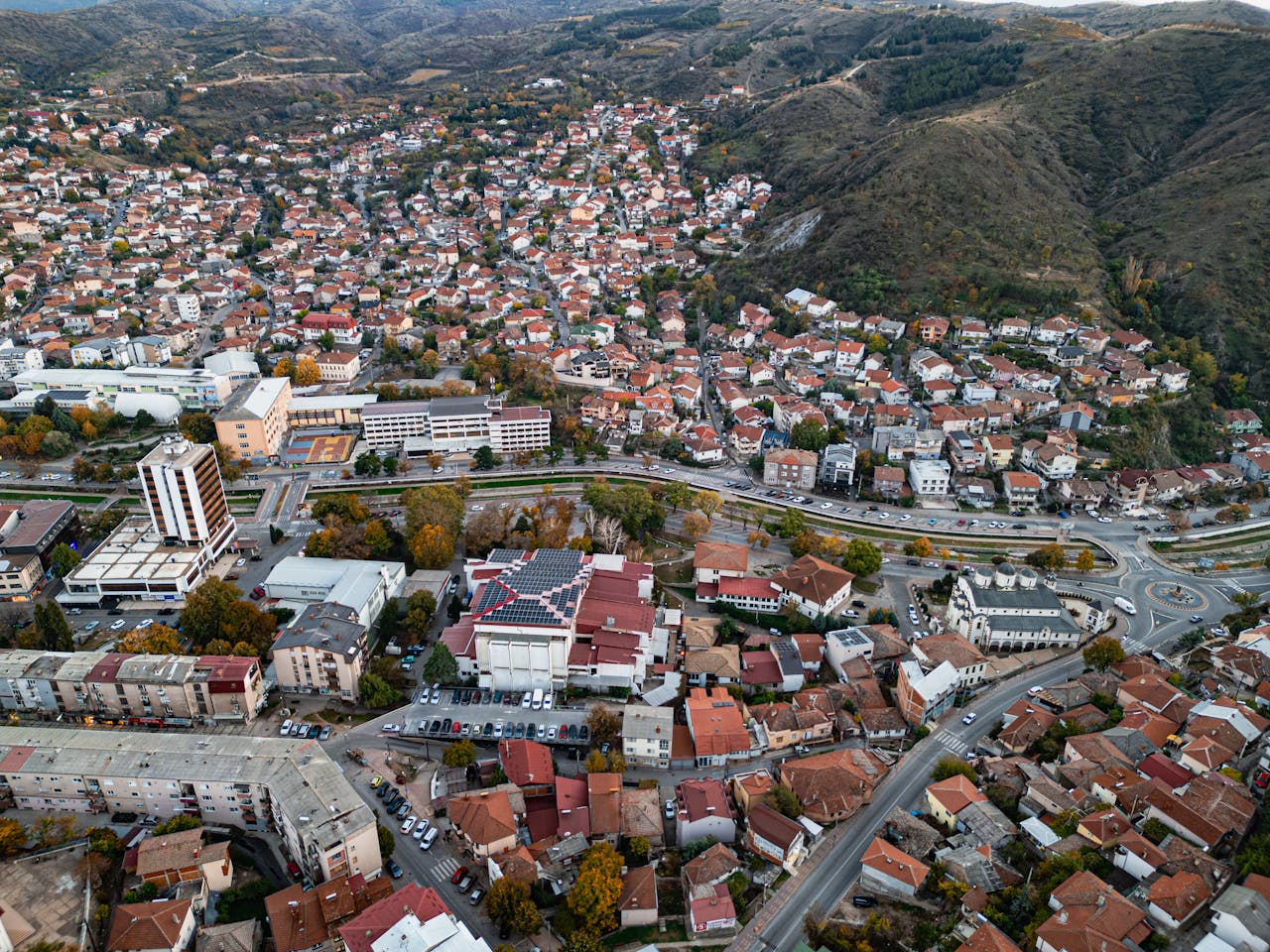 Aerial photograph showcasing the dense cityscape of Shtip, North Macedonia during fall.